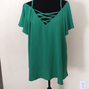 Green cold shoulder blouse.